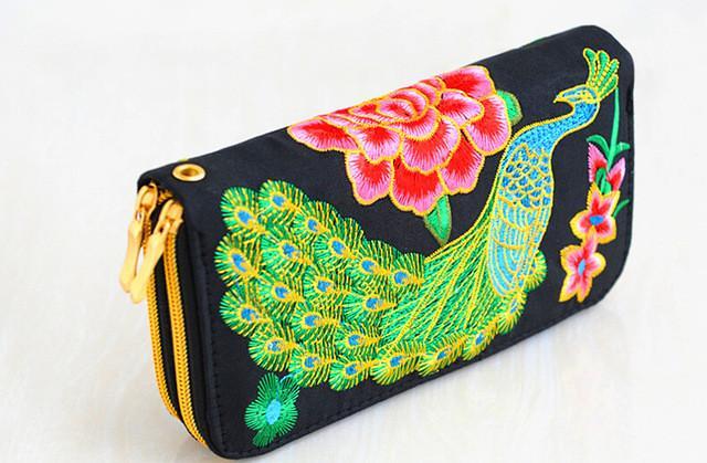 Enchanting Feathered Splendor Wallets | wallet | Indulge in the allure of timeless elegance with our exquisite Embroidered Peacock Wallets. Crafted w